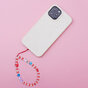 Cordon de bracelet en perles rouges pour t&eacute;l&eacute;phone avec coeurs